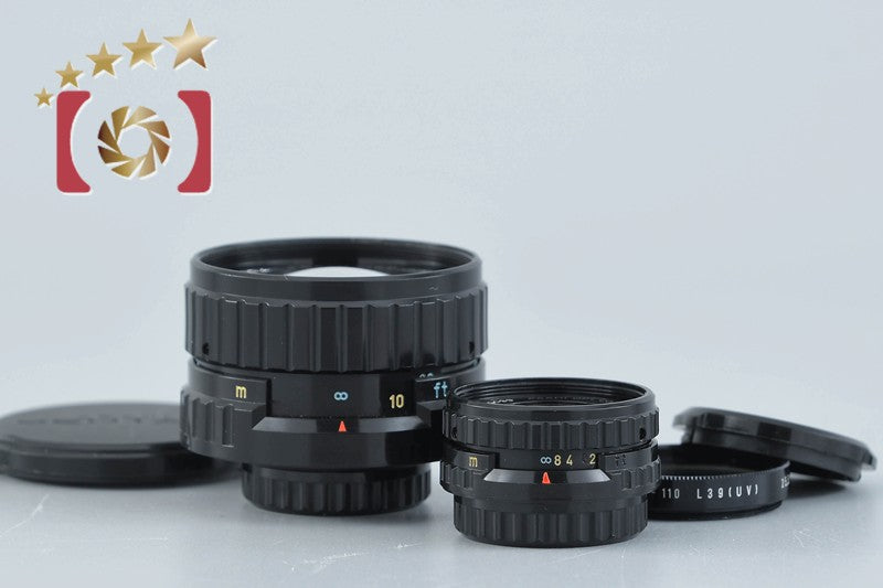 Pentax 110 24mm f/2.8 + 50mm f/2.8