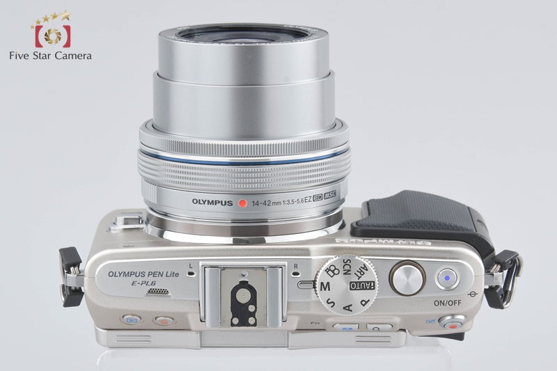"Count 803" Olympus PEN Lite E-PL6 Silver 16.1 MP 14-42 EZ Lens