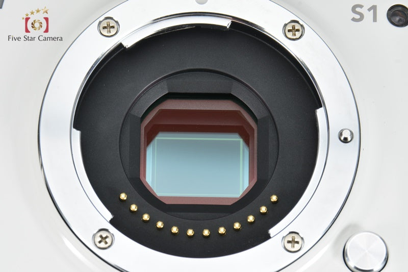 Very Good!! Nikon 1 S1 White 10.1MP Digital Mirrorless Camera