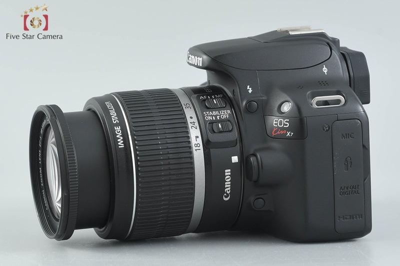 Canon EOS Kiss X7 / Rebel SL1 / 100D 18.0 MP EF-S 18-55 IS Lens