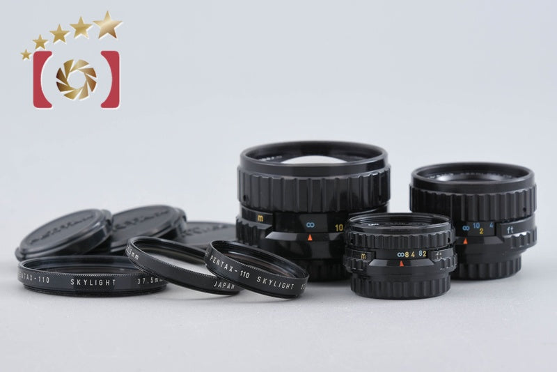 Pentax 110 18mm f/2.8 + 24mm f/2.8 + 50mm f/2.8