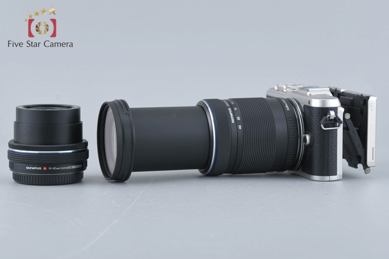 Count 717 Olympus PEN E-PL8 Silver 16.1 MP 14-42 40-150 Lenses [Very Good]