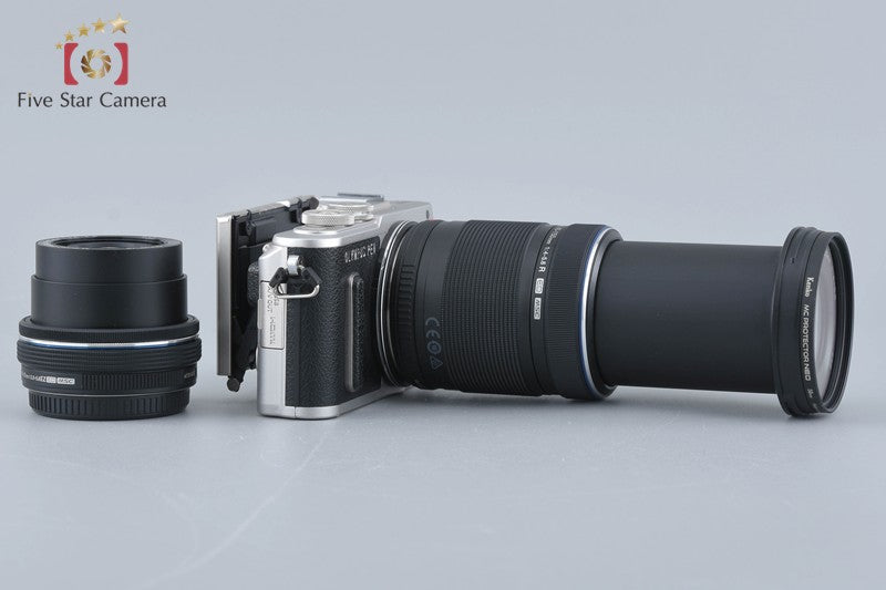 Count 717 Olympus PEN E-PL8 Silver 16.1 MP 14-42 40-150 Lenses [Very Good]