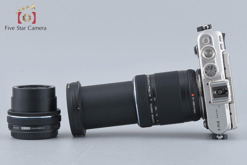 Count 717 Olympus PEN E-PL8 Silver 16.1 MP 14-42 40-150 Lenses [Very Good]