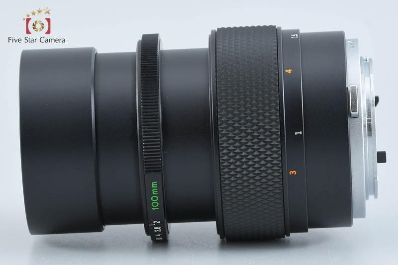 Olympus ZUIKO AUTO-T 100mm f/2 [Very Good]